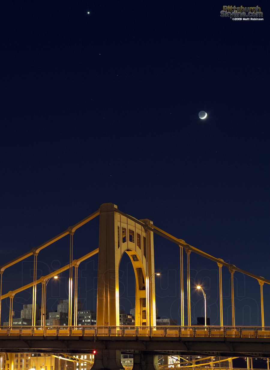 Crescent moon over the Rachel Carson Bridge